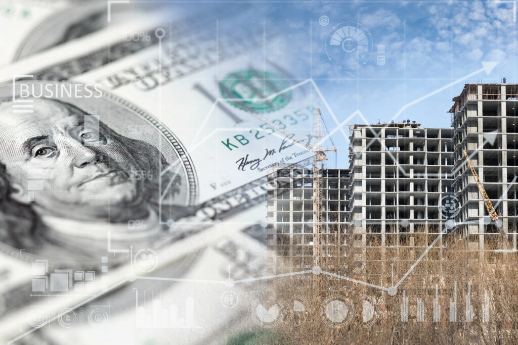 Image of money and an apartment complex under construction using SEO for marketing.